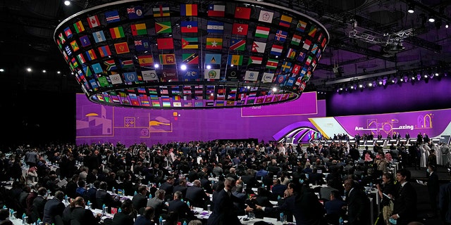 Afgevaardigden wonen de FIFA-conferentie bij in het Doha Exhibition and Convention Centre in Doha, Qatar, donderdag 31 maart 2022.