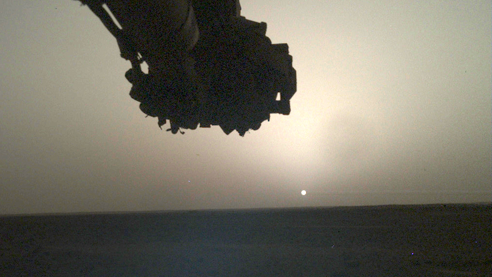 NASA's Insight-sonde maakte dit beeld van de zonsopgang op Mars op 10 april 2022.