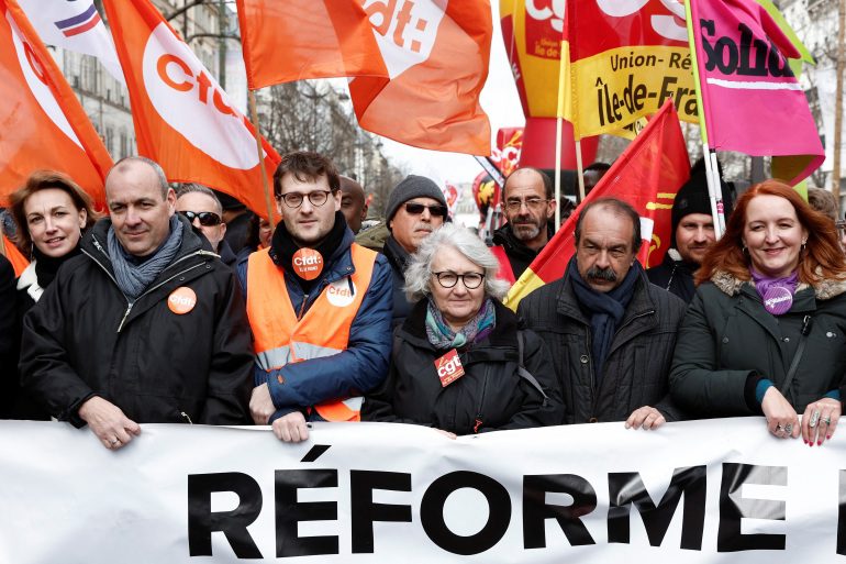 Franse vakbonden protesteren tegen het pensioenhervormingsplan van de regering in Parijs, 11 maart 2023.
