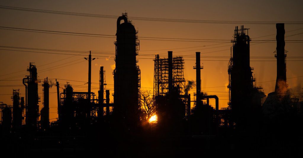 Exxon Mobil en Chevron kondigen een daling van hun winst aan