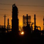 Exxon Mobil en Chevron kondigen een daling van hun winst aan